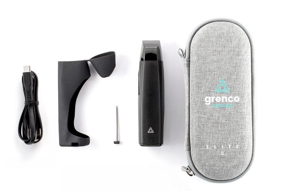 Grenco Medical Elite II kit contents including the vaporiser, USB-C cable, silicone sleeve, pick tool, and hemp travel case.